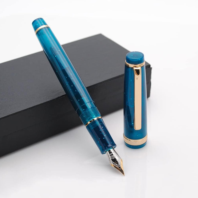 Jinhao 82 Transparent Deep Sea Blue Celluloid Fountain Pen with Fine Nib, Gold Clip & Ink Converter