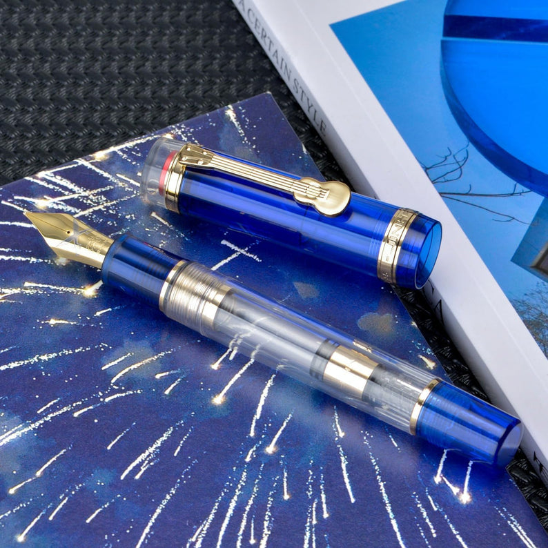 Jinhao 1935 Fountain Pen Tiandao Series - Fine Nib, Blue With Clear Transparent Acrylic Body And Gold Guitar Clip With Large Converter